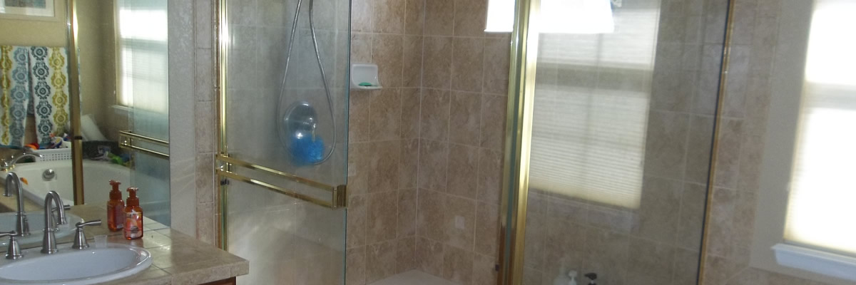 Framed shower enclosure installed by A&A Glass Co.