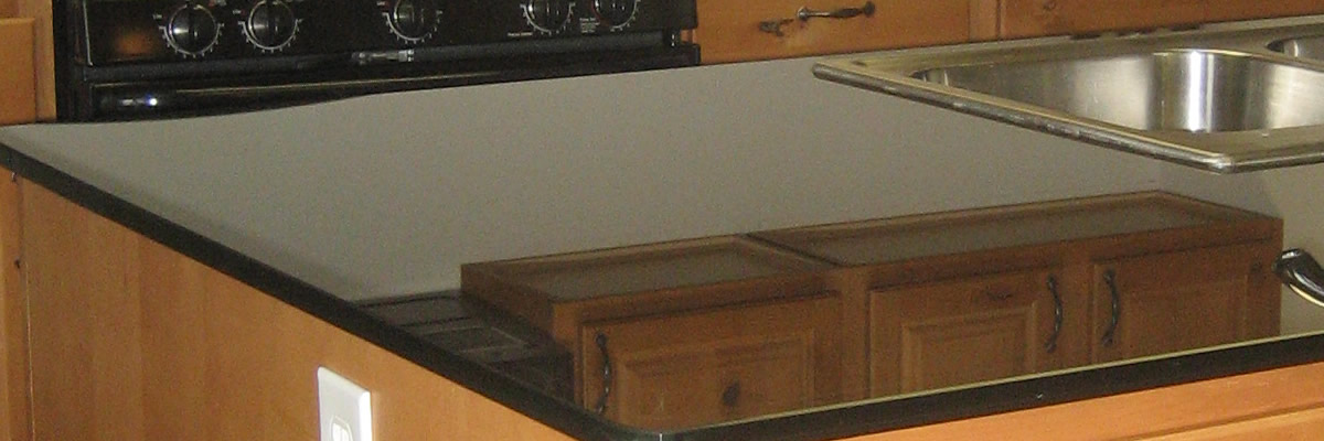 Custom glass countertop installation by A&A Glass Co.